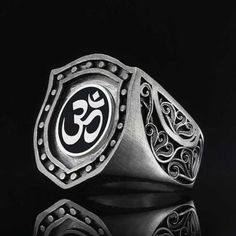 "❥ All of our cargoes are sent by express shipment. Cargoes can be delivered to Europe within 1-2 days after product preparation, to USA and Canada within 2-4 days, to Australia, Asian- Othe American countries and other regions within 3-5 days. Silver Enamel Hinduism Ring, Sterling Silver OM ring, Buddha Ring, Hindu Ring, Boho Ring, Spritual Ring You can have these precious ring models designed with religious symbols for you and for your loved ones. Whether to show your style or simply use them Precious Rings, Religious Symbols, Black Rhodium, Silver Enamel, Gold Plated Silver, Boho Rings, Sterling Ring, Custom Jewelry, Statement Rings