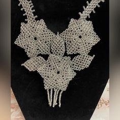 Beautiful Artesanal Necklace! Give Your Wardrobe A Pop Of Glam With This Beautiful Necklace!Nwot #Artesanal #Necklaces #Necklacelover #Jewelry #Accessories #Boutique #Fashion #Collaresdemoda #Joyasartesanales #Hermoso #Ngboutique #Colorglamsparkle Https://Ngboutique.Company.Site Handmade Silver Beaded Necklaces With Flower Shape, Handmade Silver Flower-shaped Beaded Necklaces, Handmade Silver Beaded Necklaces For Evening, Silver Handmade Beaded Necklaces For Evening, Boutique Fashion, Beautiful Necklace, Beautiful Necklaces, Womens Jewelry Necklace, Jewelry Accessories