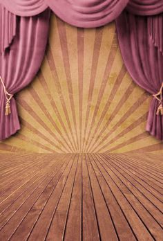 an empty stage with purple curtains and wooden flooring in front of a sunburst background