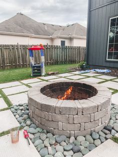 a fire pit sitting in the middle of a yard