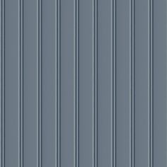 a blue wall with vertical lines on it's sides and the bottom half painted gray