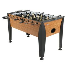 the foosball table is made from wood and metal