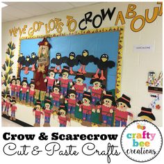 a classroom bulletin board decorated with scarecrows and paper cut outs for halloween decorations