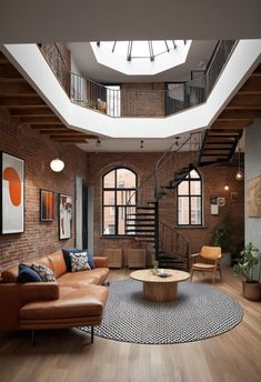 a living room filled with furniture and a spiral staircase