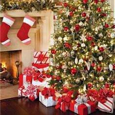 a decorated christmas tree with presents under it