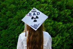 a woman wearing a graduation cap that says it's been rad