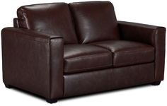 a brown leather loveseat sitting up against a white background