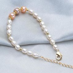 This beautiful Freshwater pearl bracelet ranges between 7-8mm in size and consists of beautiful and lustrous pearls in AAAA+ quality. All pearls in this bracelet are round and are strung with silk thread and double-knotted between each pearl. Known as the 'icon' of cultured pearls, Freshwater pearls have graced the necks, ears, fingers, and wrists of women for decades. Huge Tomato imports their Freshwater pearls from the Freshwater rs of Japan, grown in the Pinctada fucata oyster. All of our Fre Pearl Bracelet With 8mm Beads, Gold Pearl Bracelet With 8mm Beads, Baroque Pearl Bracelet With Pearl Drop, Rose Gold Pearl Bracelets With Pearl Chain, Pearl White Baroque Pearl Bracelet With Round Beads, Rose Gold Pearl Beaded Bracelets, Pearl White Baroque Pearl Bracelet, Akoya Pearl Charm Bracelet With Round Beads, Akoya Pearl Bracelet With Round Beads And Pearl Charm