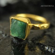 "ARTSMYRNA METAL: 925k Silver GEM: Raw Gemstone Emerald Approx Diameter Stone Size: 8-10 mm COATING: 24k gold over (We can made a special type of coating for your personal preference ) MATERIEL : 925K Sterling Silver ( Some of my items vermeil gold over silver for looks rich . But i can finish in silver too ) RING SIZE: 6 (your desired size is made) Features It is the divine gem of Goddess Venus. It is also known as \"Healer Stone\". It has the ability to maintain emotional, physical and spiritu Handmade Emerald Ring For May Birthstone Gift, Handmade Emerald Ring For Anniversary May Birthstone, Adjustable Green Emerald Ring For Wedding, Handmade Rings For Formal Occasions With May Birthstone, Handmade Formal Rings With May Birthstone, Initial Necklace Silver, Silver Bridesmaid, Smaragd Ring, River Edge