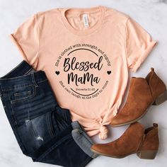 She is clothed with strength and dignity; she can laugh at the days to come. -Proverbs 31:25 Catholic Shirt, Bible Verse Wall Decor, Angel Wall Art, He First Loved Us, Blessed Mama, She Is Clothed, Mama Tee, Lion Of Judah, Personalised Canvas