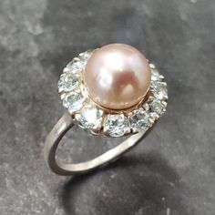 Peach Pearl Ring, Natural Pearl, Vintage Ring, June Birthstone, Natural Blue Topaz, Birthstone Ring, Vintage Pearl Ring, Solid Silver Ring Diamond White Pearl Ring With Center Stone, Elegant Gemstones With Halo Setting For Anniversary, Elegant Pear-shaped Topaz Ring For Gift, Diamond White Pearl Ring With Center Stone, Round Cut, Elegant Anniversary Gemstones With Halo Setting, Classic Round Gemstones With Center Stone, Elegant Cluster Gemstones For Anniversary, Elegant Round Gemstones With Halo Setting, Elegant Round Gemstones For Anniversary