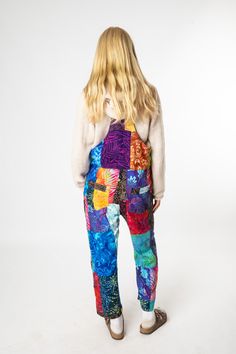 Reap the rewards of the hippie style harvest with these cropped patchwork overalls! These uniquely chic unisex overalls feature coconut buttons on the sides and straps, a useful front chest joey pocket, and adjustable straps. The bright colors and eclectic batik patchwork make these bohemian overalls perfect for any adventure from painting to dancing, globe traveling to road tripping. Boho chic meets high hippie fashion in an explosion of colors and patterns, meet your new favorite overalls! PLE Bohemian Overalls, Unisex Overalls, Patchwork Overalls, Hippie Fashion, Travel Globe, Sweet Stories, Small Chest, Hippie Style, Bright Colors