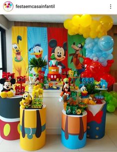 mickey mouse birthday party with balloons and decorations