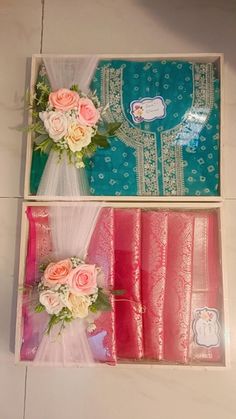 two boxes with flowers and ribbons in them