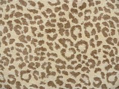 a brown and white animal print fabric