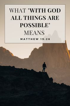 a man standing on top of a mountain with the words, what's with god all things are possible means