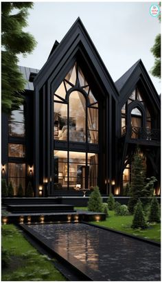 a large black house with lots of windows