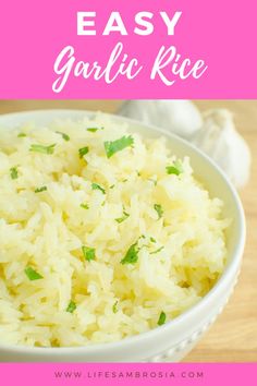 a white bowl filled with garlic rice on top of a wooden table