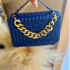 Blue Purse Gold Chain Can Be Worn As Handbag Or Crossbody Trendy Blue Bag With Chain Detail, Trendy Blue Evening Bag, Blue Rectangular Bag With Chain Strap, Rectangular Blue Bag With Chain Strap, Blue Shoulder Bag With Adjustable Strap For Party, Chic Blue Bag With Chain Detail, Chic Blue Bag With Chain, Elegant Blue Bag With Chain Detail, Chic Blue Chain Bag