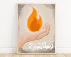 a hand holding a flame with the words i am a disple of jesus christ on it