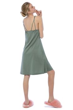 Vert color Slip Nightgown. 100% mercerised Peruvian pima cotton. Lightweight jersey fabric A line silhouette. Lined with supportive bralette with elastic underband. Adjustable shoulder straps. Baboosha Paris loungewear apparel. Fair trade. Made in Peru. Camisole Slip Dress With Built-in Bra For Loungewear, Sleeveless Slip Dress With Built-in Bra For Loungewear, Spring Lounging Sleepwear With Built-in Bra, Spring Sleepwear With Built-in Bra For Lounging, Stretch Sleepwear With Built-in Bra For Summer, Seamless Camisole Dress For Loungewear, Loungewear Camisole With Adjustable Spaghetti Straps, Seamless Spaghetti Strap Daywear Dresses, V-neck Sleepwear With Adjustable Straps