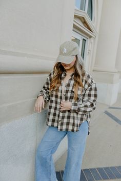 Upgrade your Fall wardrobe with our Brown Checker Button Down Shacket! Made of soft flannel, this oversized shirt features a stylish brown checkered pattern, long sleeves, and a classic collar. Perfect for chilly days, this shacket is a must-have for any fashion-forward individual. runs true to size with loose fit 100% POLYESTER model, Brooke is wearing a size small Brown Button-up Flannel Shirt For Everyday, Everyday Brown Button-up Flannel Shirt, Brown Relaxed Fit Classic Flannel Shirt, Brown Classic Relaxed Fit Flannel Shirt, Oversized Classic Fall Flannel Shirt, Classic Oversized Button-up Flannel Shirt, Classic Brown Relaxed Fit Flannel Shirt, Brown Cotton Shacket For Everyday, Everyday Brown Cotton Shacket