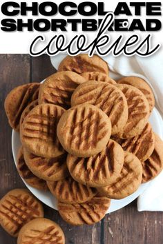 chocolate shortbread cookies on a white plate with the words, chocolate shortbread cookies