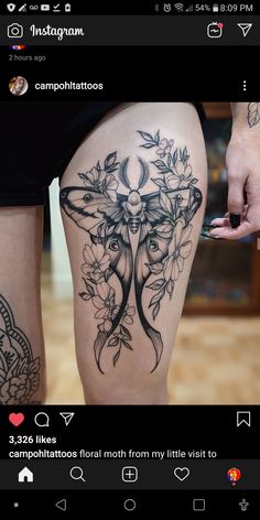 a woman's legs with tattoos on them