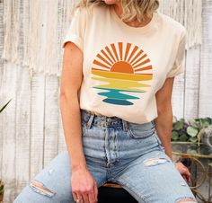 "Summer Sunset Shirt, Summer Vacation Gift Shirt, Retro Sunset Shirt, Summer Lover Tee, Family Trip Shirt, Summer Outfit, Summer Vacation Tee ❤️ With the utmost love & enthusiasm, we design each of our T-Shirts and send them to you! ❤️ How to order: 1-) Check and review each photo. 2-) From the \"Size\" menu, choose the model and size of your T-shirt. 3-) Choose the color of your T-shirt from the \"Primary Color\" menu. 4-) Choose as much of the quantity as you like. 5-) Press ADD TO CART. You can finish the checkout process or return at any moment to add more product colors for your family members. 6-) Please select \"Proceed to Check Out\". 7-) Your shirts will be prepared for shipping within 1-3 business days. Do not hesitate to get in touch with me. I'm prepared to assist you. Although Quirky Graphic Tees, Sunshine Shirt, Sunset Shirt, Boho Beachy, Beachy Vibes, Retro Sunset, Sun Shirt, Retro Summer, Family Trip