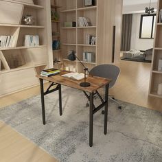 a computer desk sitting on top of a wooden table in front of a book shelf