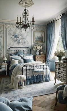 the bedroom is decorated in blue and white