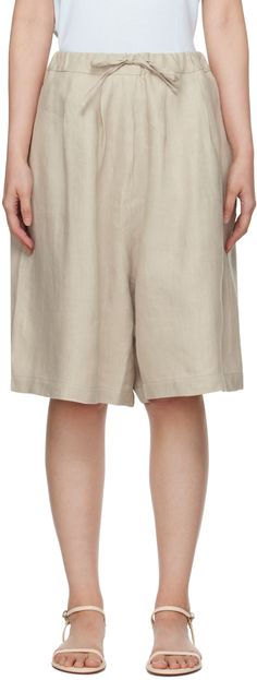 Wide-leg European Flax™-certified organic linen shorts. · Low-rise · Drawstring at elasticized waistband · Two-pocket styling · Mock-fly · Pleats at front Supplier color: Toasted Linen Knee-length Shorts For Work, Knee-length Linen Bottoms For Workwear, Linen Bermuda Bottoms For Work, Relaxed Fit Linen Bermuda Shorts For Workwear, Knee-length Linen Bottoms With Relaxed Fit, Beige Linen Bermuda Bottoms, Linen Knee-length Shorts With Pockets, Knee-length Linen Bottoms With Pockets, Knee-length Linen Shorts With Pockets