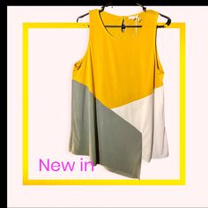 New With Tags Mysteree Brand Size Large Tri-Color Tank In Mustard, Grey & White With Keyhole Button Back (Extra Button Included), Cool Asymmetrical Hem In The Front Of Shirt. Made Of 70% Modal, 30% Polyester. Super Soft Fabric And Beautiful Colors. Lightweight Fabric. Great Summer Colors Summer Sleeveless Color Block Tops, Summer Color Block Sleeveless Tops, Yellow Color Block Sleeveless Top, Gray Color Block Top For Summer, Gray Color Block Summer Top, Spring Sleeveless Color Block Tops, Lace Weave, Sheer Tank Top, Asymmetrical Blouse