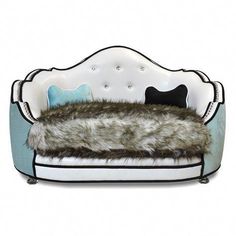 a dog bed with fur on top of it