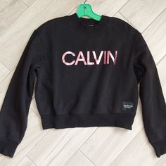 Calvin Klein Performance Nwot Black Long Sleeve Cropped Sweatshirt. Size Large Barbie Pink Metallic Graphic "Calvin "/Ribbed Knit Neck, Cuffs & Bottom/Do Not Dry Clean Length - 20 In/Chest - 21 In Across Front/Sleeve - 22 In My Environment Is Smoke Free. Black Sweatshirt With Ribbed Collar For Spring, Gym Hoodie, Pink Metallic, Cropped Sweatshirt, Neck Hoodie, Calvin Klein Woman, Workout Hoodie, Cotton Hoodie, Crop Sweatshirt