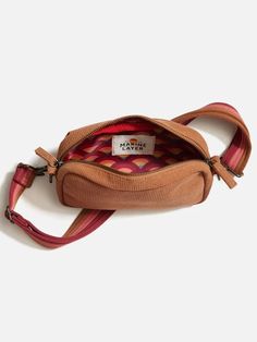 Marine Layer 100% Polyester 100% Recycled Polyester Lining 8.5" L x 4.5" H x 2.5" D This fanny pack, waist bag, belt bag—whatever you want to call it—truly does it all. Made to fit your phone, keys, wallet, extra mask, and just general livelihood. And it features an adjustable waist strap and is made from a durable yet comfortable canvas-like material. The fanny pack is back, baby! And we're here for it. 📦 Free standard shipping on orders $150 or more 🛍️ Free in-store pick up at La Grange Casual Brown Belt Bag With Belt Loops, Bag Belt, Marine Layer, Waist Strap, Waist Bag, Fanny Pack, Belt Bag, Mask, Wallet