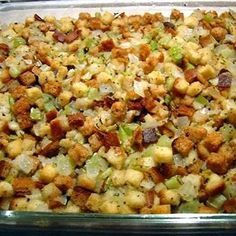 a casserole dish filled with stuffing and vegetables