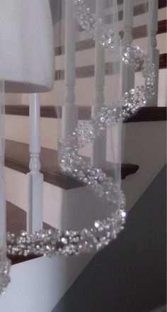 the stairs are covered with clear glass beads