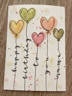 a card with some balloons floating in the air