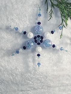 This is a handmade one of a kind unique glass beaded snowflake ornament. This ornament would look beautiful hanging on a Christmas tree or just to add some sparkle to your holiday decorations. Snowman Bead Ornament, Snowflake Ideas, Beaded Snowflakes Ornament, Beaded Snowflake, Beaded Snowflakes, Reading Pa, Handmade Glass Beads, Beading Ideas, Beaded Ornaments