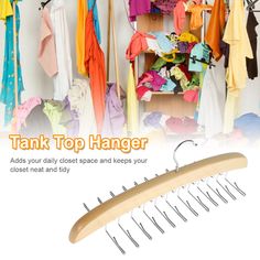 a rack with clothes hanging on it and the words tank top hanger above it