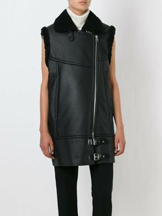 [MM6] Maison Martin Margiela   Black Sleeveless Biker Vest Sz 40    Description  Condition : New with Tags / Labels damaged   Style : Sleeveless Biker Vest  Color : Black   Size : Sz 40 / Medium   Retail Price : 895 Euro / $ 1,100  Product Detail : Strap detailing / Coated effect / Faux fur / Faux Leather /                             Classic Neckline / Two Pockets / Zip / Raw-cut hem  Payment                                      We only accept payment through PayPal. If payment is not received Sleeveless Biker Outerwear For Spring, Spring Sleeveless Biker Outerwear, Black Sleeveless Edgy Outerwear, Edgy Black Sleeveless Outerwear, Biker Vest, Martin Margiela, Black Sleeveless, Faux Fur, Faux Leather