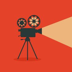 a movie projector on a tripod with a light shining in the middle and red background