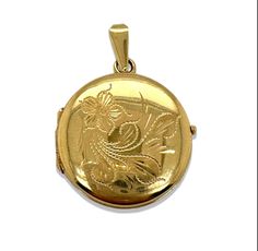 Large Circular Locket with hand engraving. vintage 1960s. Measures without bail: H:24.15x W:25.35 D:5.50mm  With bail: H  35.12mm Metal:14K Yellow Gold  Weight: 8.73grams  Circa 1960s  Every Antique piece of jewelry we sell at Heirloom Pavé has been checked for safety of each prong and repaired as needed. With any pre-owned/Vintage/Antique items, it is common to have some wear, As we inspect each piece of our jewelry, we make sure the wear and tear is acceptable within industry standards FOLLOW Antique Round Jewelry With Hallmark, Vintage 14k Stamped Medallion Jewelry, Vintage Engraved Round Jewelry, Vintage Self-winding Jewelry As Gift, Vintage Self-winding Jewelry Gift, Locket Vintage, Vintage Locket, Vintage Lockets, Gold Locket