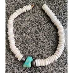 This Vintage Pucca Necklace Is A Beautiful Piece Of Native American Jewelry. The Necklace Features A Large Turquoise Pendant With Natural Strung Shells. The Chunky Shells Are Set In A Choker Style, Giving The Necklace A Unique And Stylish Look. The Necklace Is Perfect For Those Who Appreciate Nature And Cultural Diversity. The Blue Color Of The Stones And The Shell Material Make It A Great Accessory For Any Outfit. This Necklace Is A Rare Find And Would Make A Great Addition To Any Jewelry Colle Pucca Shell Necklace, Cultural Diversity, Choker Style, Shell Necklace, Shell Necklaces, American Jewelry, Turquoise Pendant, Native American Jewelry, Womens Jewelry Necklace