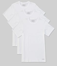 From Calvin Klein, these t-shirts feature:3-packSolid colorcrew necklineShort sleevespullover stylingSlim fitSignature classic designed with pure cotton for a soft hand and breathable comfortcottonmachine wash; tumble dryImported. Classic Calvin Klein Crew Neck Top, Stretch Cotton Calvin Klein Tops, Calvin Klein Stretch Crew Neck Top, Calvin Klein Stretch Cotton Tops, Classic Calvin Klein Short Sleeve T-shirt, Classic Calvin Klein Cotton Tops, Basic Crew Neck Calvin Klein T-shirt, Basic Calvin Klein Crew Neck T-shirt, Fitted Calvin Klein Short Sleeve T-shirt