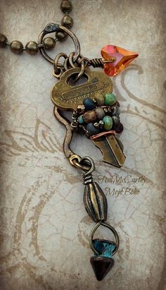 a key with some charms attached to it