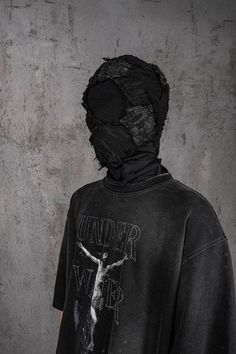 Delve into a realm where the antiquity of gothic charm blends flawlessly with the essence of wear and tear in the Distressed Jesus T-Shirt. The front is emblazoned with powerful graphics that interweave the brand's logo, creating an impactful visual narrative. The entire piece has undergone a water-washing process, resulting in a mottled, authentically aged look that speaks volumes of its vintage soul. The collar, cuffs, and hem boast a deliberately worn finish, adding to the shirt's overall all Denial Photoshoot, Masked Outfits, Mens Swag, Mask Outfit, Horror Masks, Visual Narrative, Swag Men, Vintage Soul, Jesus Tshirts