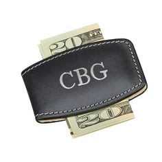 a black leather money clip with the word miguel perez on it and twenty dollar bills