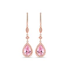 Beautiful drop earrings making for an elegant piece. Each earring is comprised of a highly polished rose gold stud, from which drops a stone set link and a large pear cut pink morganite. The rose gold perfectly accentuates the soft pink of the morganite stone.Carat Weight: 2.37 ctStone Size: 6*9 mmNumber of Stones: 2 Stone Shape: PearStone Color: Fancy PinkCarat Weight: 0.552 ctStone Size: 1.2,1,0.8 mmStone Type: Jeulia® StoneNumber of Stones: 56 Stone Shape: RoundStone Color: Diamond WhiteWeigh Silver Earrings Online, Earrings Making, Rose Gold Studs, Pink Morganite, Rose Gold Pink, Gold Stud, Lovely Earrings, Online Earrings, Pear Cut